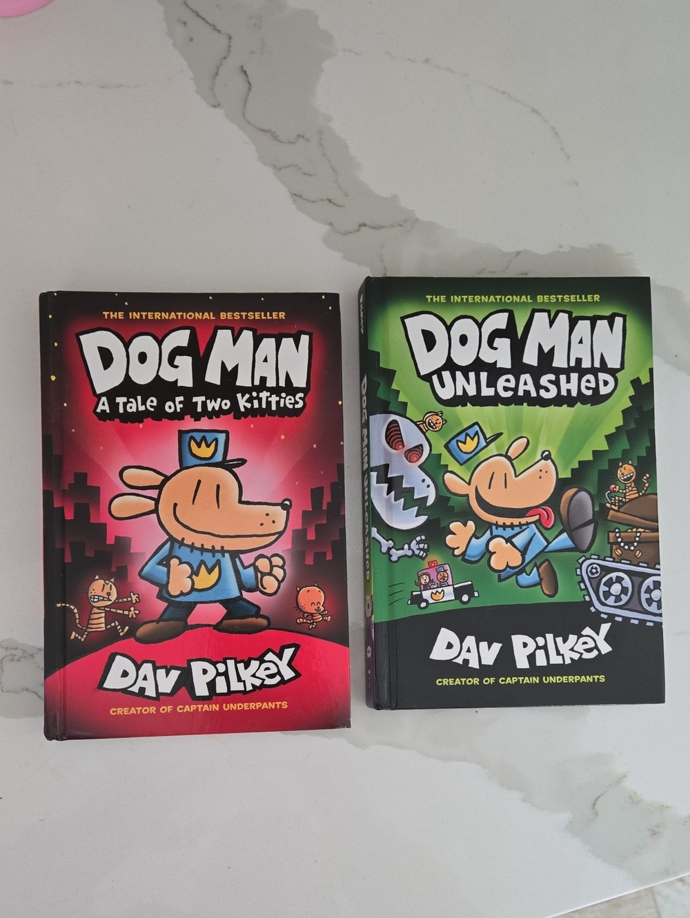 Dog Man Unleashed & A Tale of Two Kitties by - Red & Green Covers